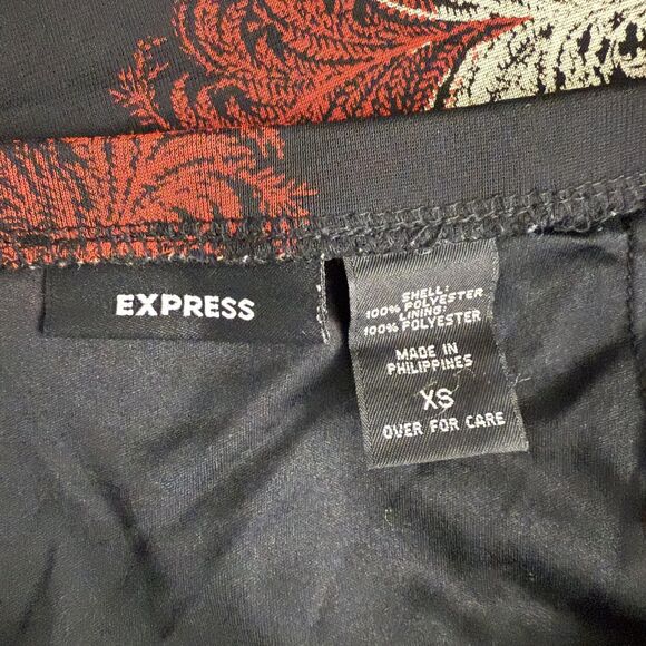 Express Women's XS Black Artsy Stretch Knit Fully Lined Flirty Hem Skirt - Picture 4 of 5